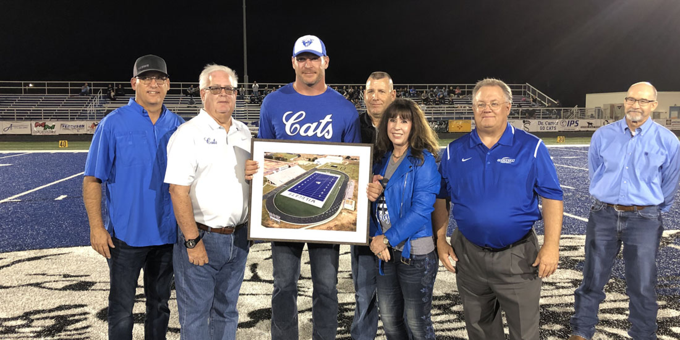 LOVINGTON HIGH SCHOOL HONORS PRO FOOTBALL HALL OF FAMER BRIAN URLACHER